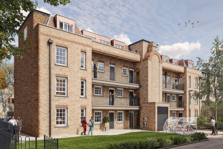 A brick 1940's residential building retrofitted. People walk towards their apartments in the block, past the bike storage and green landscaping.