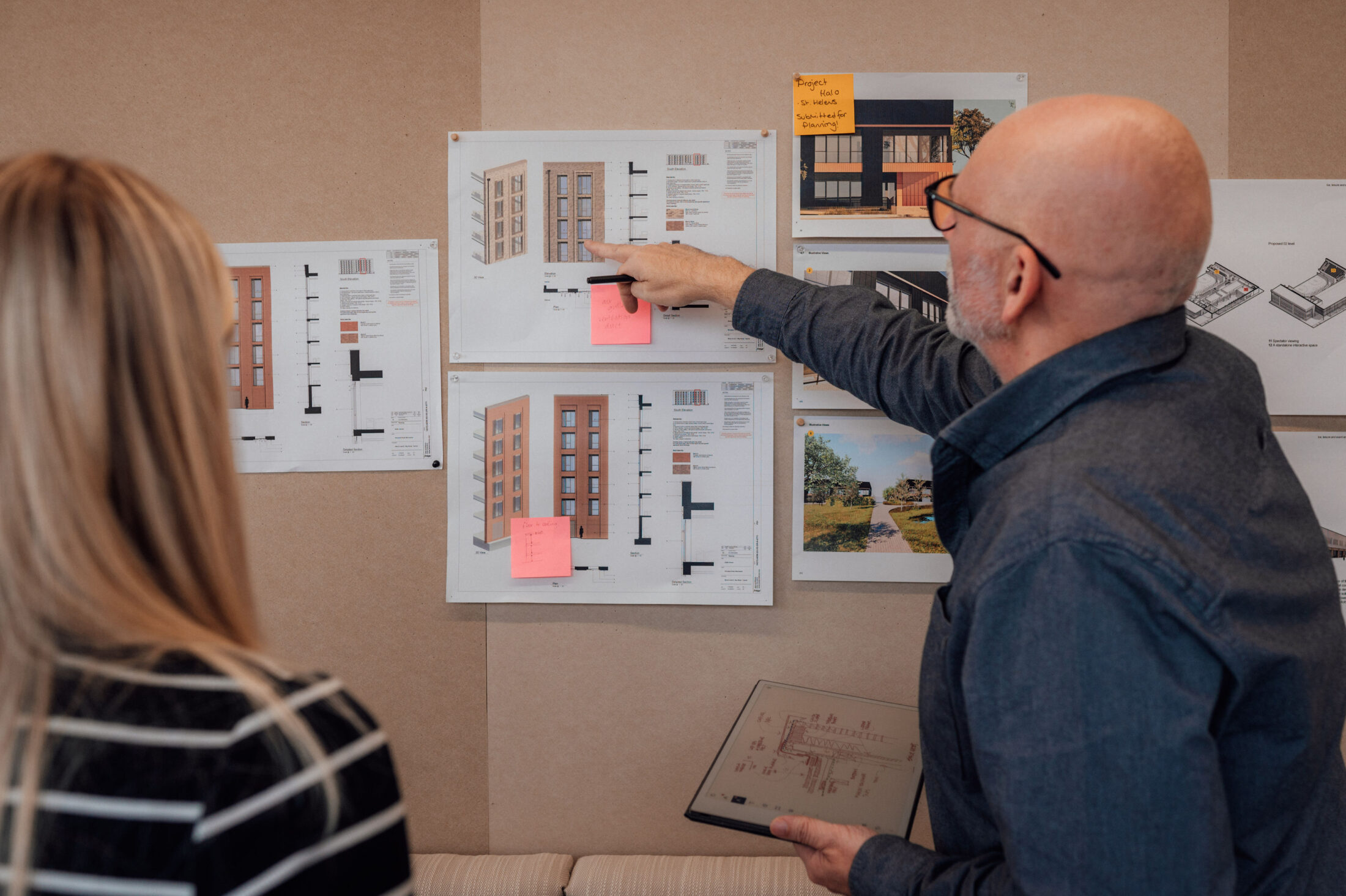 Architects Maddie Woodhead and Eleanor Strange and the Technical Lead Wayne Jones, collaborating on an architectural project